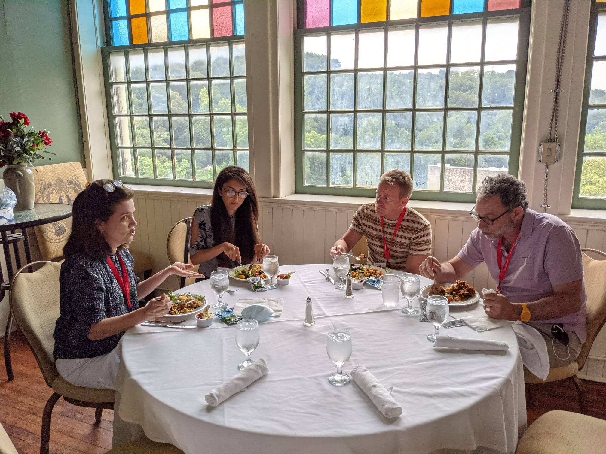 teachers sitting around a table eating