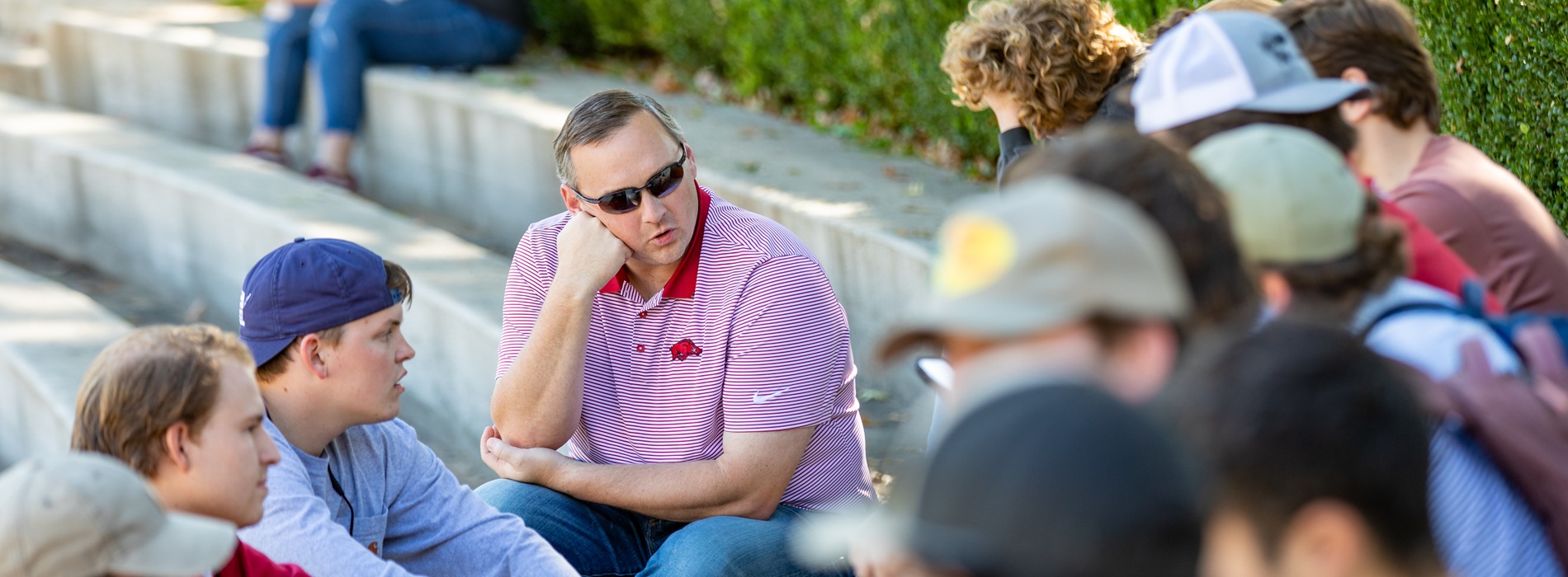 Faculty teaching class outside